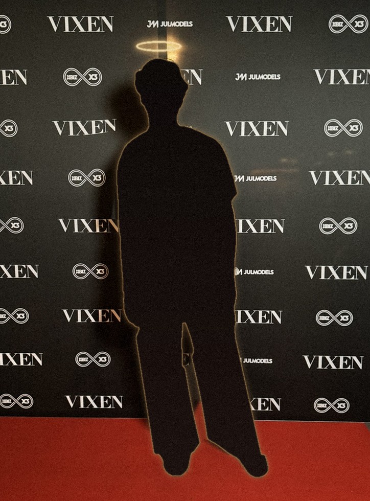 Jay Passion in silhouette on the red carpet at an industry event